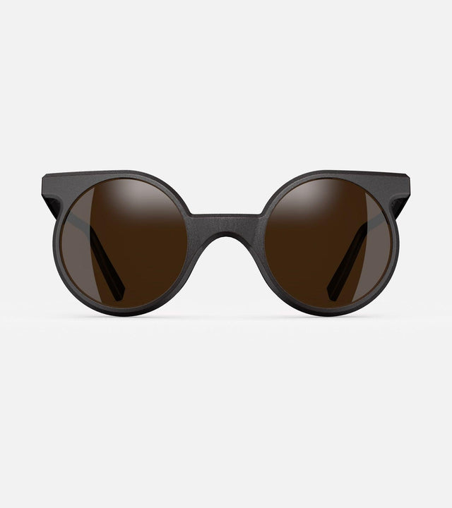Black round sunglasses with unique bridge design and brown lenses