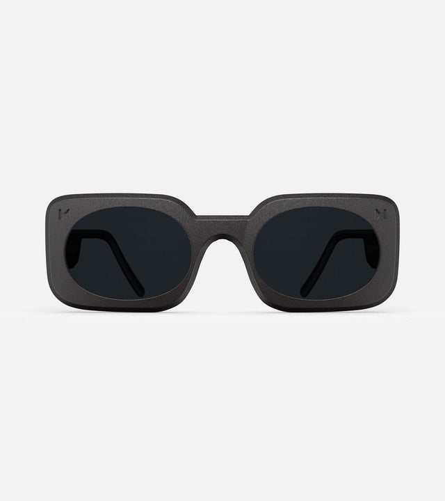 Stylish 3D printed black Planga sunglasses with a bold rectangular frame and dark lenses, designed for a comfortable fit across multiple nose bridges