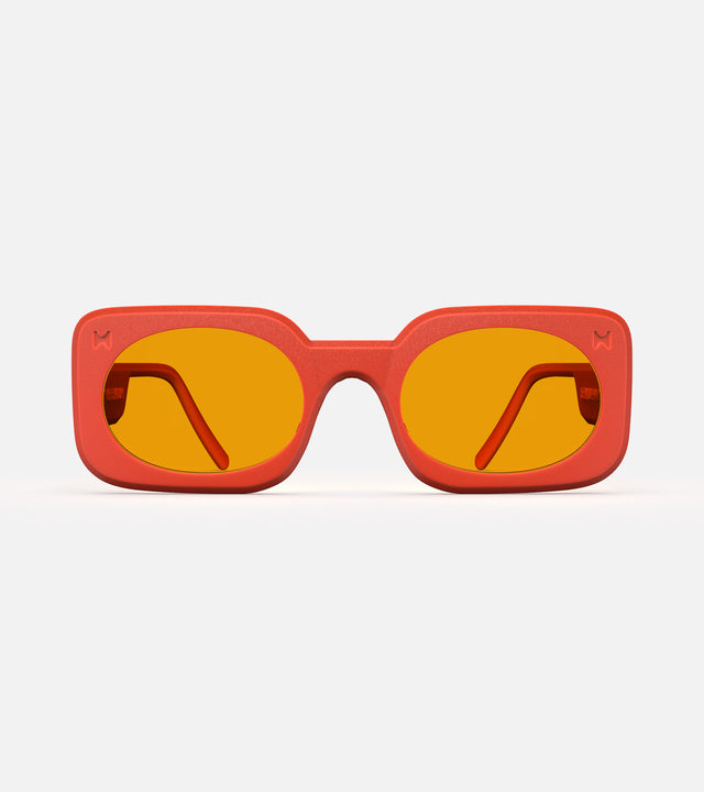 Vibrant  and high nose bridge orange Planga sunglasses by Reframd with bold, square frames and amber color lenses, ideal for sunny outings.