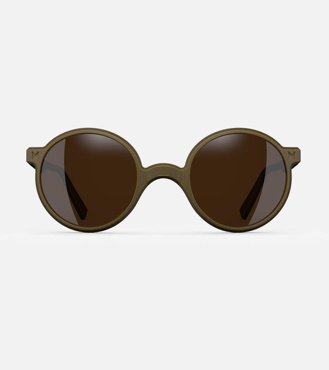 Round khaki 3D-printed glasses with dark lenses are designed for an excellent fit across various nose profiles. Offering stylish and comfortable option for those seeking unique and customizable eyewear.