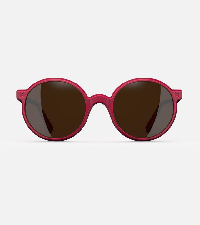 Round red 3D-printed glasses with dark lenses are designed for an excellent fit across various nose profiles. Offering stylish and comfortable option for those seeking unique and customizable eyewear.