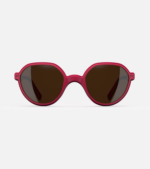 3D printed red round sunglasses with brown lenses, offering a stylish and sustainable choice for low nose bridges