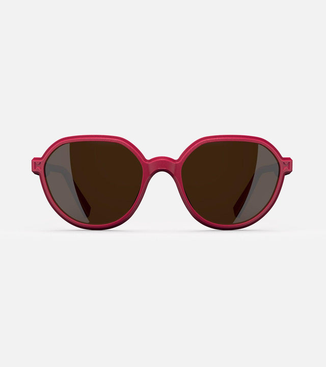 3D printed red round sunglasses with brown lenses, offering a stylish and sustainable choice for low nose bridges