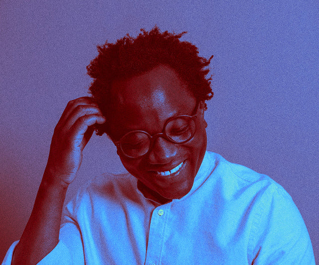 A man wearing round 3D printed sunglasses in wide nose bridge fit.