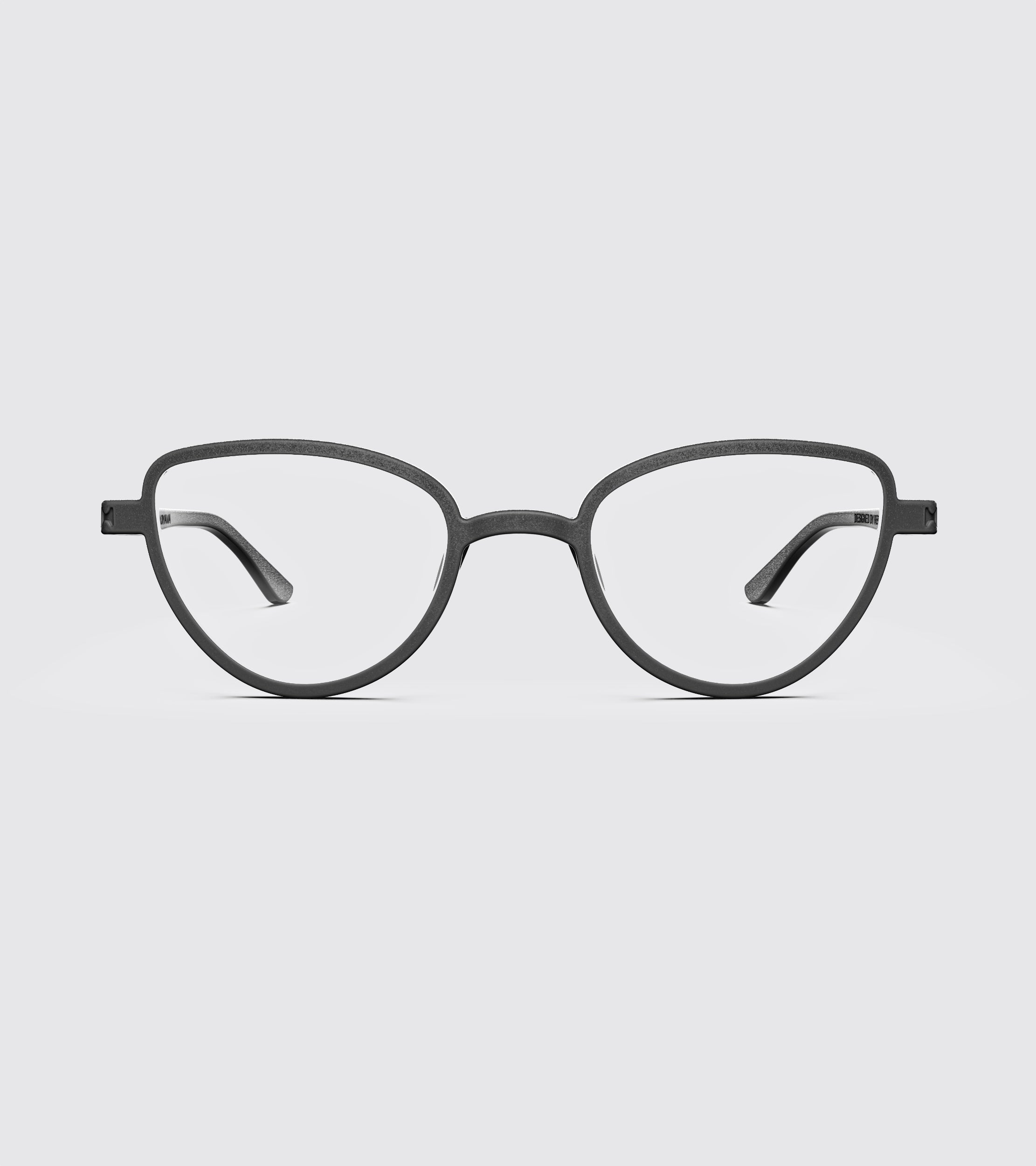 Black eyeglasses on a light gray background