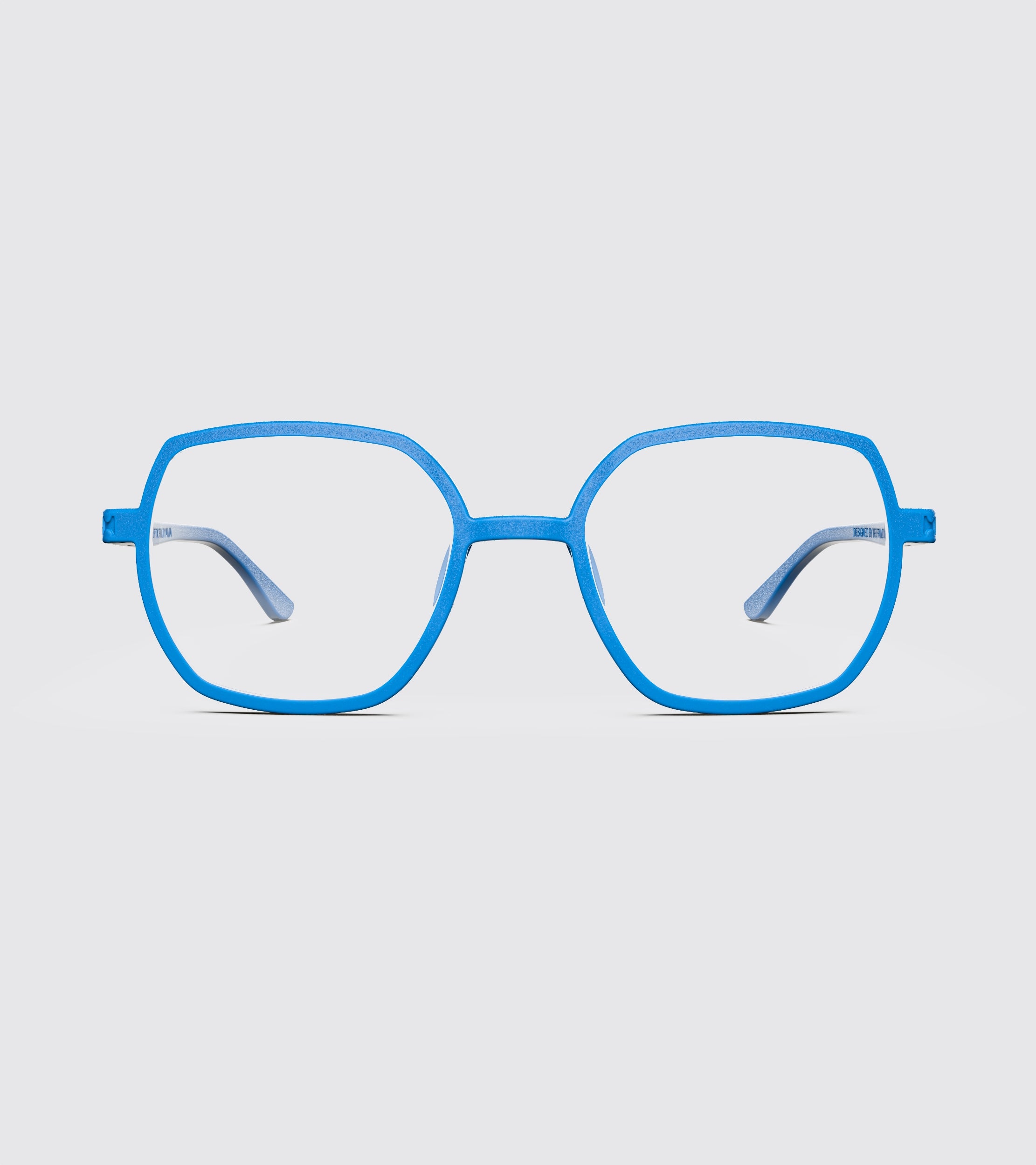Blue eyeglasses on a light gray background