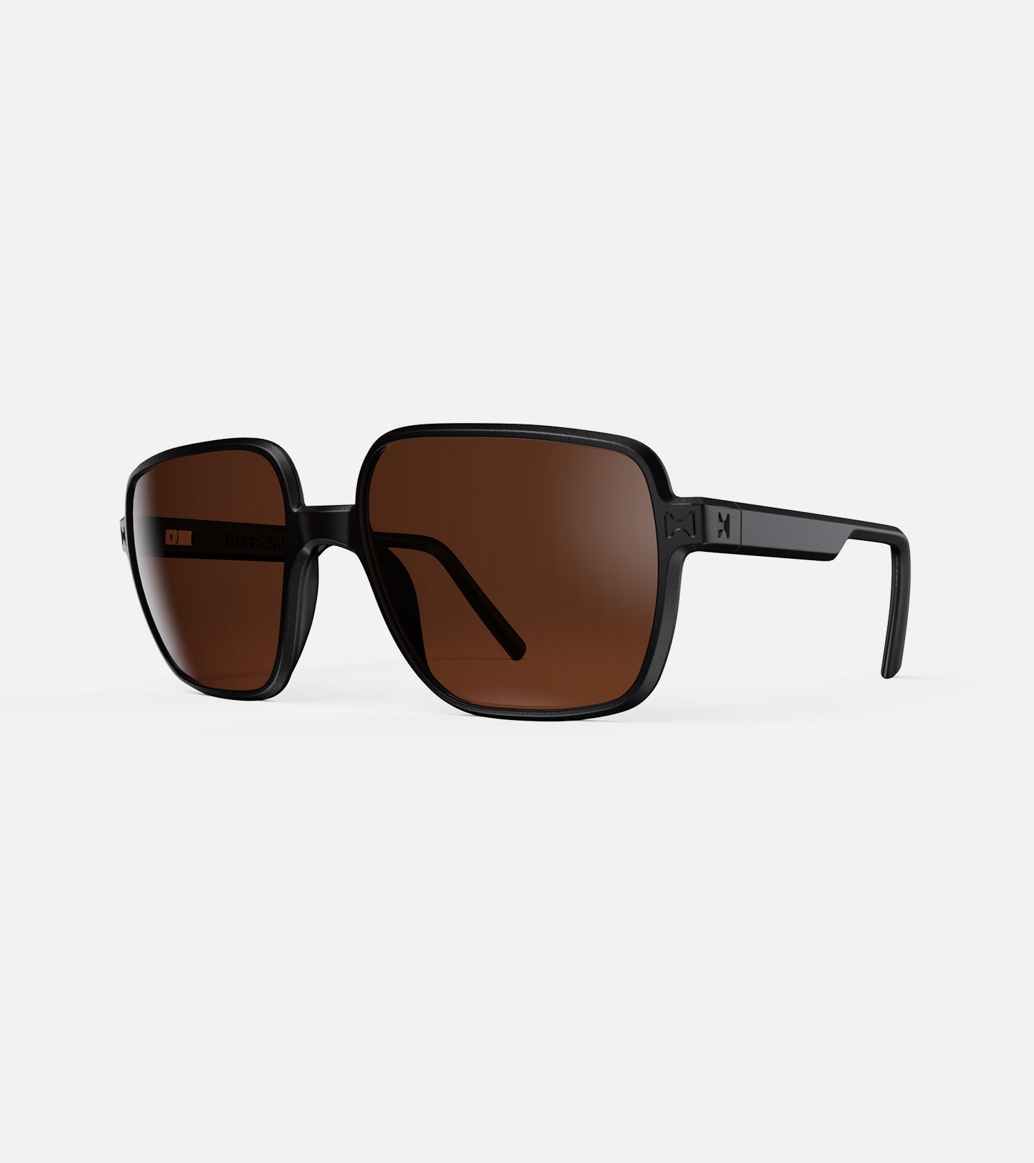Bold black square sunglasses with UV-protection, perfect for sunny days and fashion-forward individuals