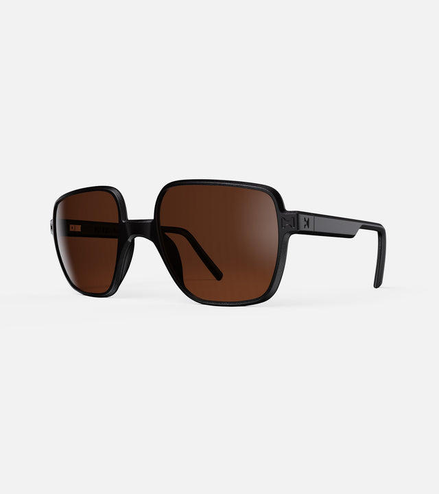 Stylish square black sunglasses with UV-protection brown lenses for a refined look.