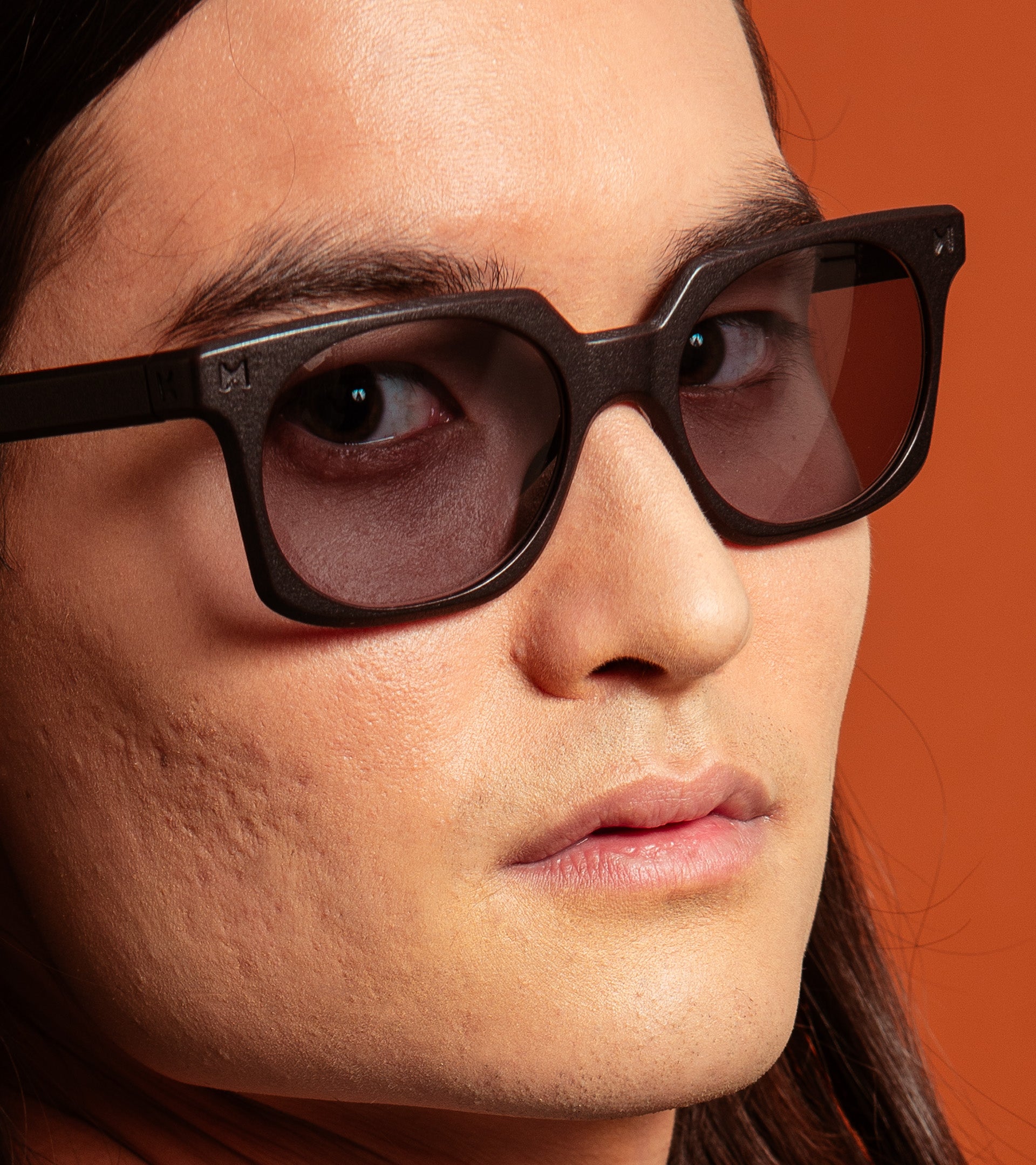 Black square sunglasses on an Asian model