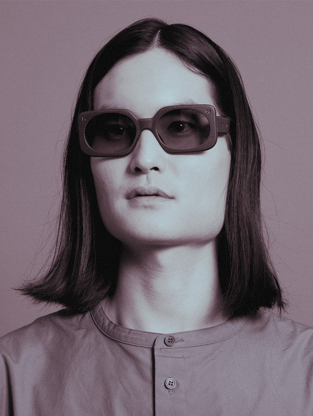 Stylish 3D printed  Planga sunglasses with a bold rectangular frame and dark lenses, designed for a comfortable fit across diverse nose bridges
