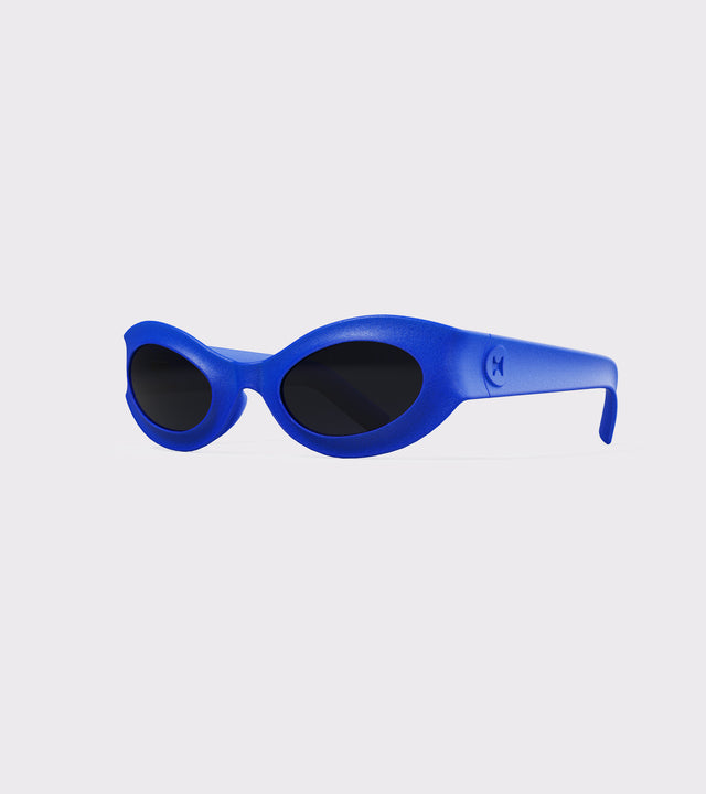 Fashion-forward blue oval sunglasses, blending classic shape with a modern twist