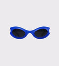 Futuristic blue oval sunglasses with dark lenses, perfect for bold fashion lovers