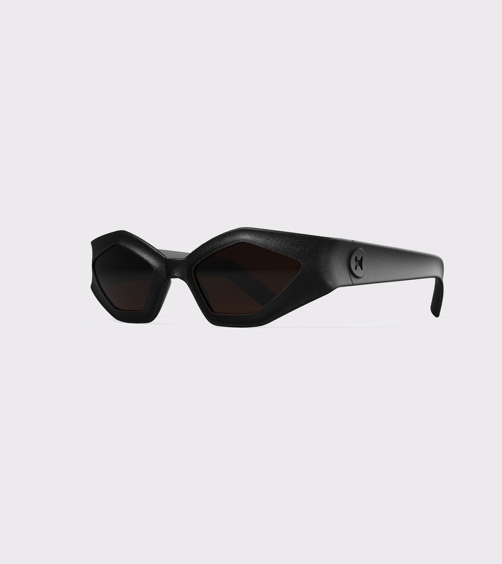 Bold black 3D printed sunglasses with angular frames and dark lenses, offering a unique style and a great fit for various nose bridges
