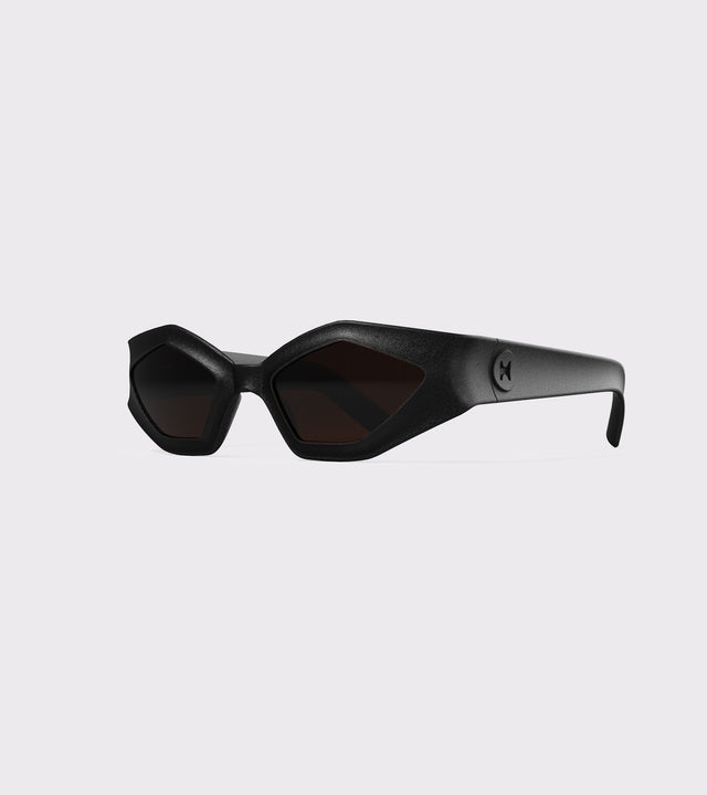 Bold black 3D printed sunglasses with angular frames and dark lenses, offering a unique style and a great fit for various nose bridges