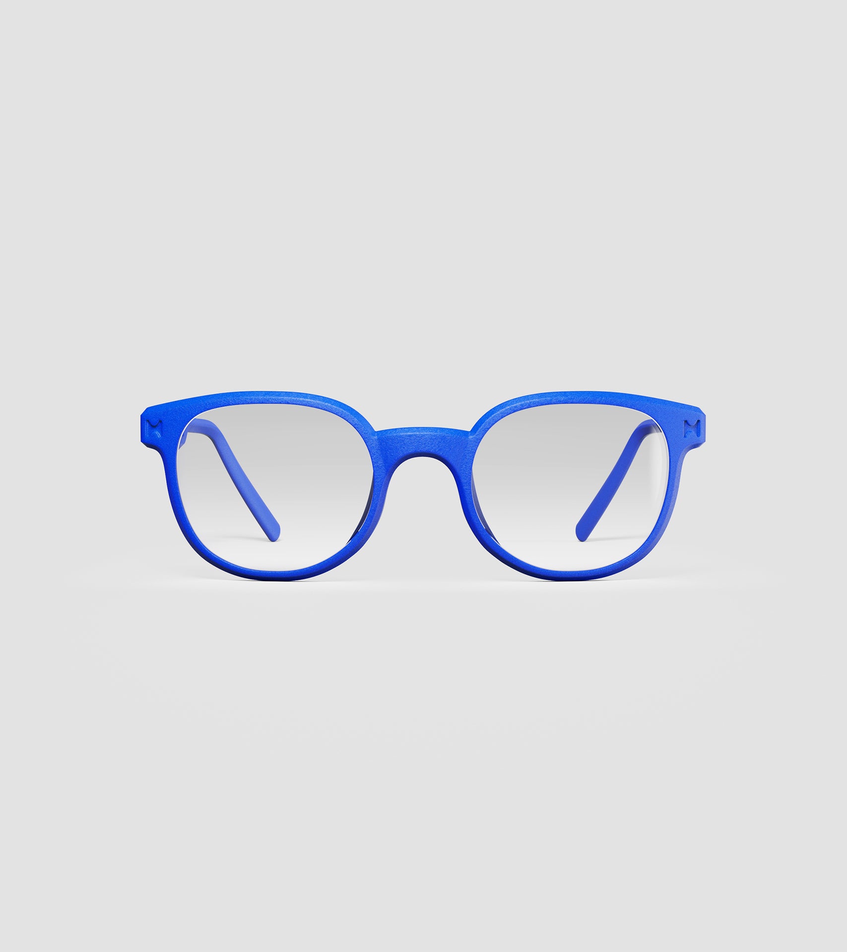 Blue 3D printed glasses with clear lenses, featuring a versatile and comfortable fit for various nose profiles, perfect for those seeking modern, stylish eyewear with customization options