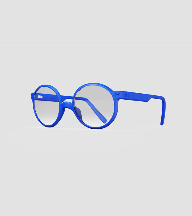 Round blue 3D-printed glasses with clear lenses are designed for an excellent fit across various nose profiles. Offering stylish and comfortable option for those seeking unique and customizable eyewear.
