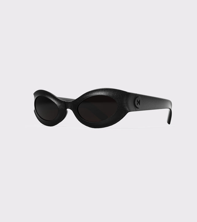 Chic black oval sunglasses with a minimalist yet bold frame design