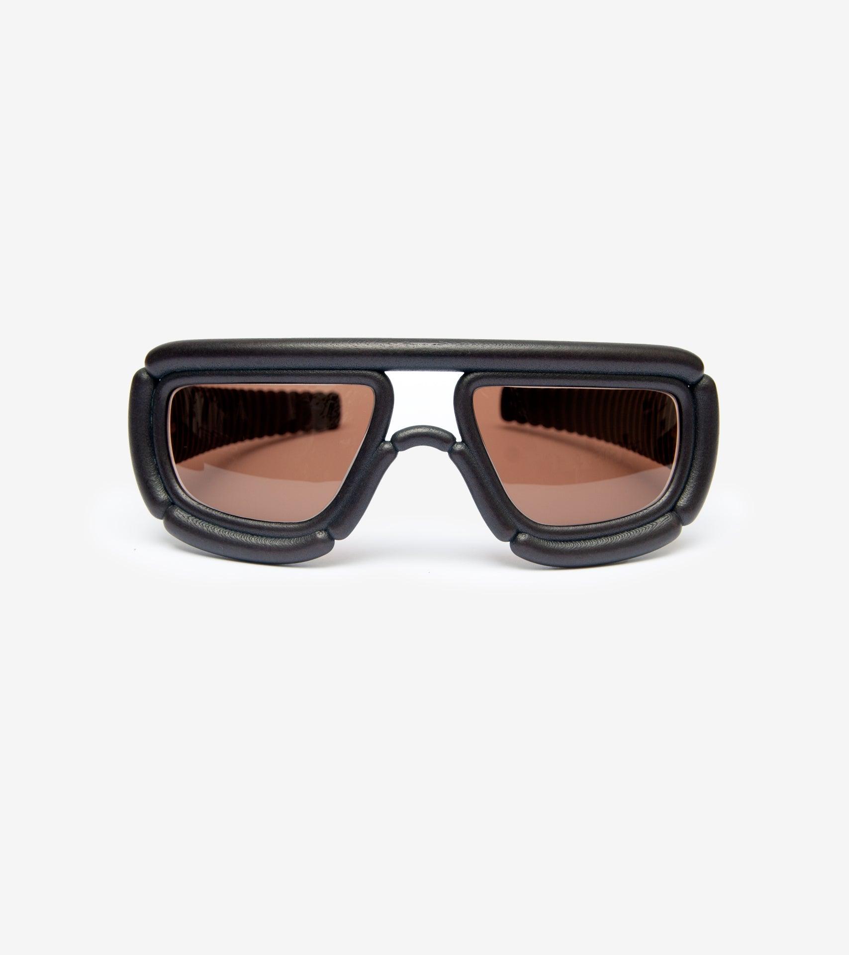 Innovative 3D-printed sunglasses in black, designed for a bold and futuristic fashion statement