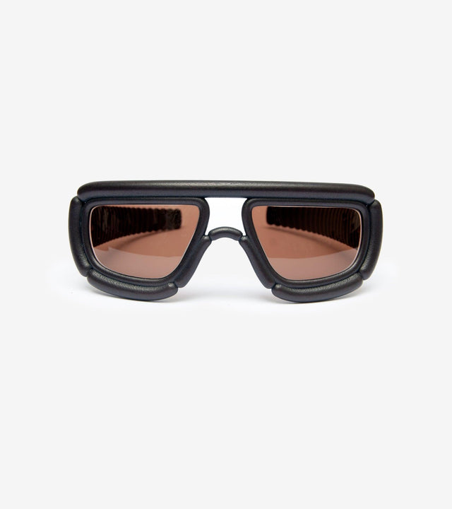 Innovative 3D-printed sunglasses in black, designed for a bold and futuristic fashion statement