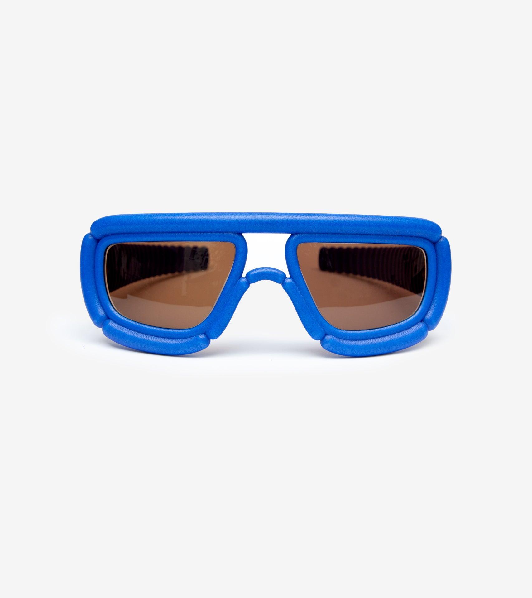 Cutting-edge blue sunglasses with cushioned frame, offering a futuristic and stylish look