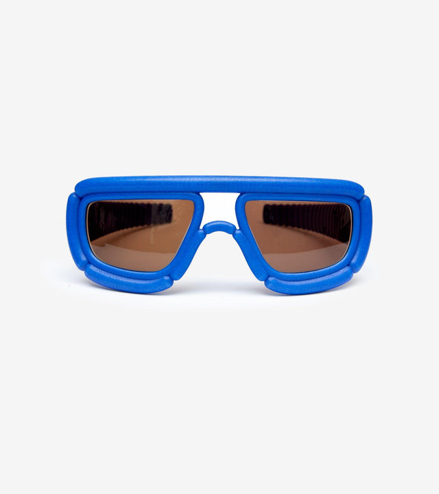 Cutting-edge blue sunglasses with cushioned frame, offering a futuristic and stylish look