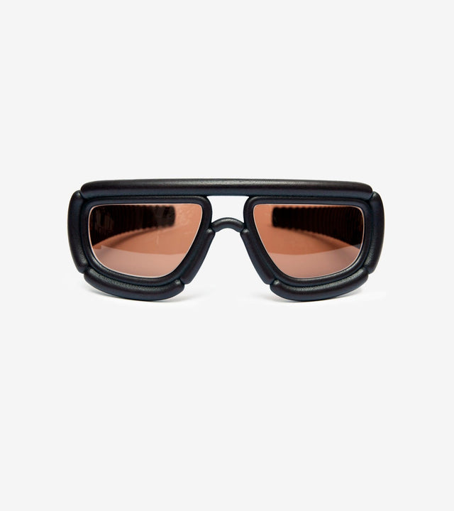 Futuristic 3D-printed black sunglasses with bold, cushioned frames for unique style.