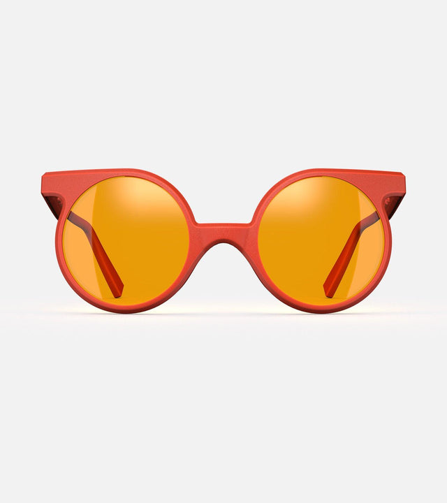 Red round sunglasses with a bold bridge for standout style