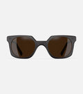 Black square-frame glasses with dark lenses, designed with an inclusive fit for all nose bridges, featuring a modern minimalist design
