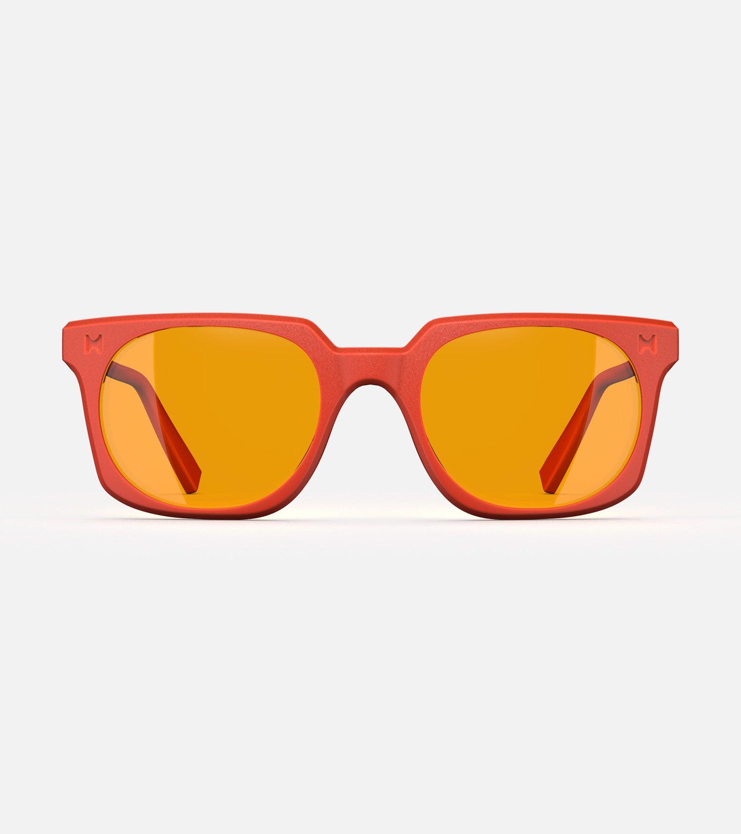 Orange square frame glasses with yellow lenses, designed with an inclusive fit for all nose bridges, featuring a modern minimalist design