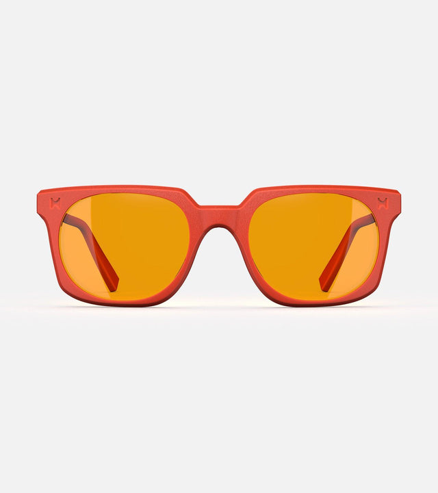Orange square frame glasses with yellow lenses, designed with an inclusive fit for all nose bridges, featuring a modern minimalist design