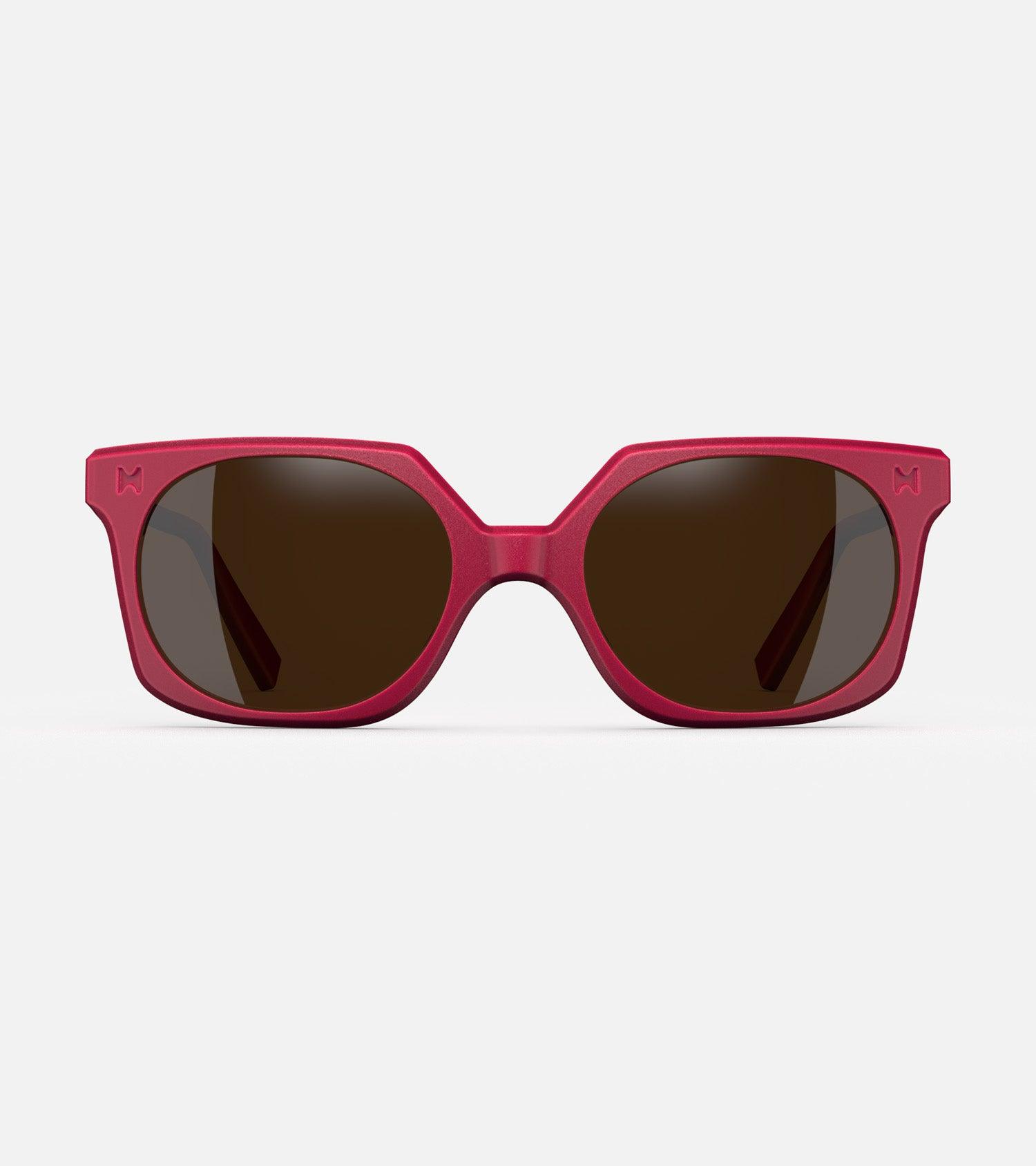 Red square-frame glasses with dark lenses, designed with an inclusive fit for all nose bridges, featuring a modern minimalist design