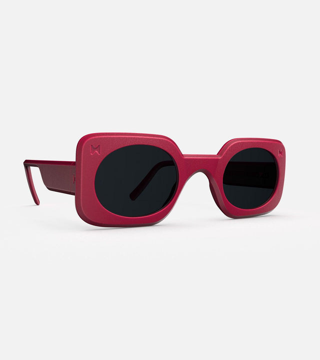 Stylish 3D printed red Planga sunglasses with a bold rectangular frame and dark lenses, designed for a comfortable fit across diverse nose bridges