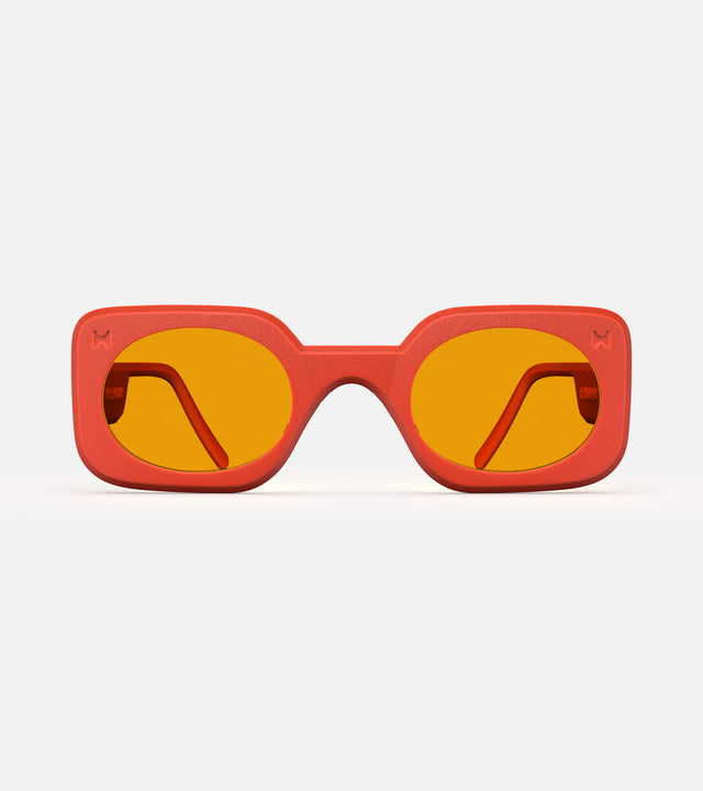 Vibrant orange Planga sunglasses by Reframd with bold, square frames and amber color lenses, ideal for sunny outings.