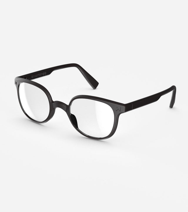 Modern black framed glasses for Asia fit nose bridges with round brown lenses on a white background