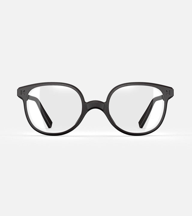 Modern black framed glasses for Asia fit nose bridges with round brown lenses on a white background