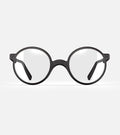 Round black 3D-printed glasses with clear lenses are designed for an excellent fit across various nose profiles. Offering stylish and comfortable option for those seeking unique and customizable eyewear.