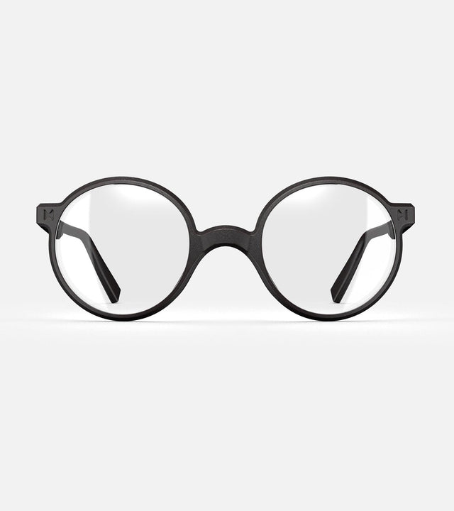 Round black 3D-printed glasses with clear lenses are designed for an excellent fit across various nose profiles. Offering stylish and comfortable option for those seeking unique and customizable eyewear.