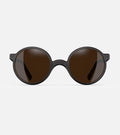 Round black 3D-printed glasses with dark lenses are designed for an excellent fit across various nose profiles. Offering stylish and comfortable option for those seeking unique and customizable eyewear.