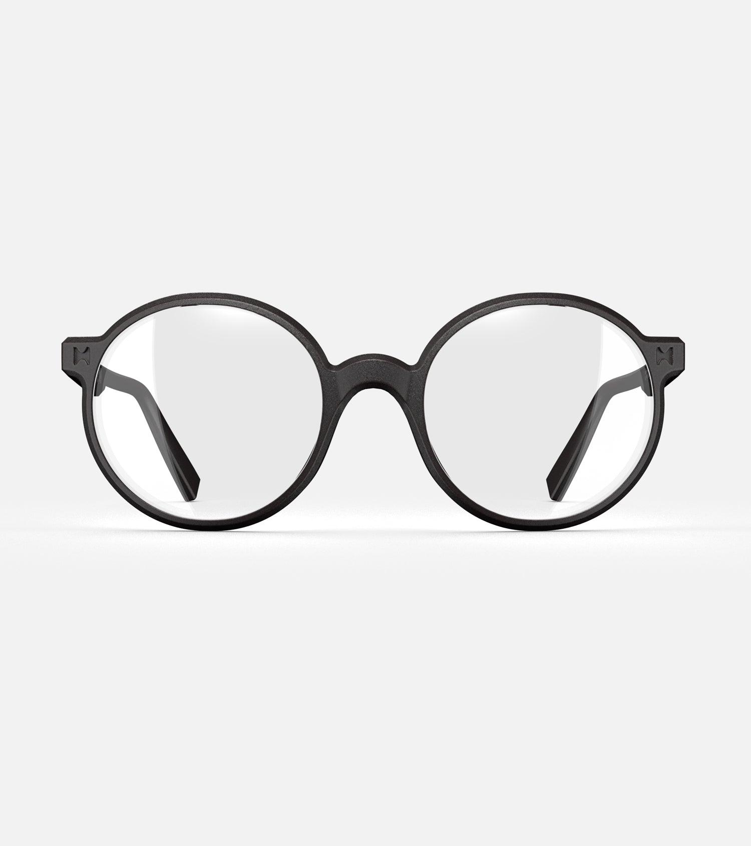 Round black 3D-printed glasses with clear lenses are designed for an excellent fit across various nose profiles. Offering stylish and comfortable option for those seeking unique and customizable eyewear.