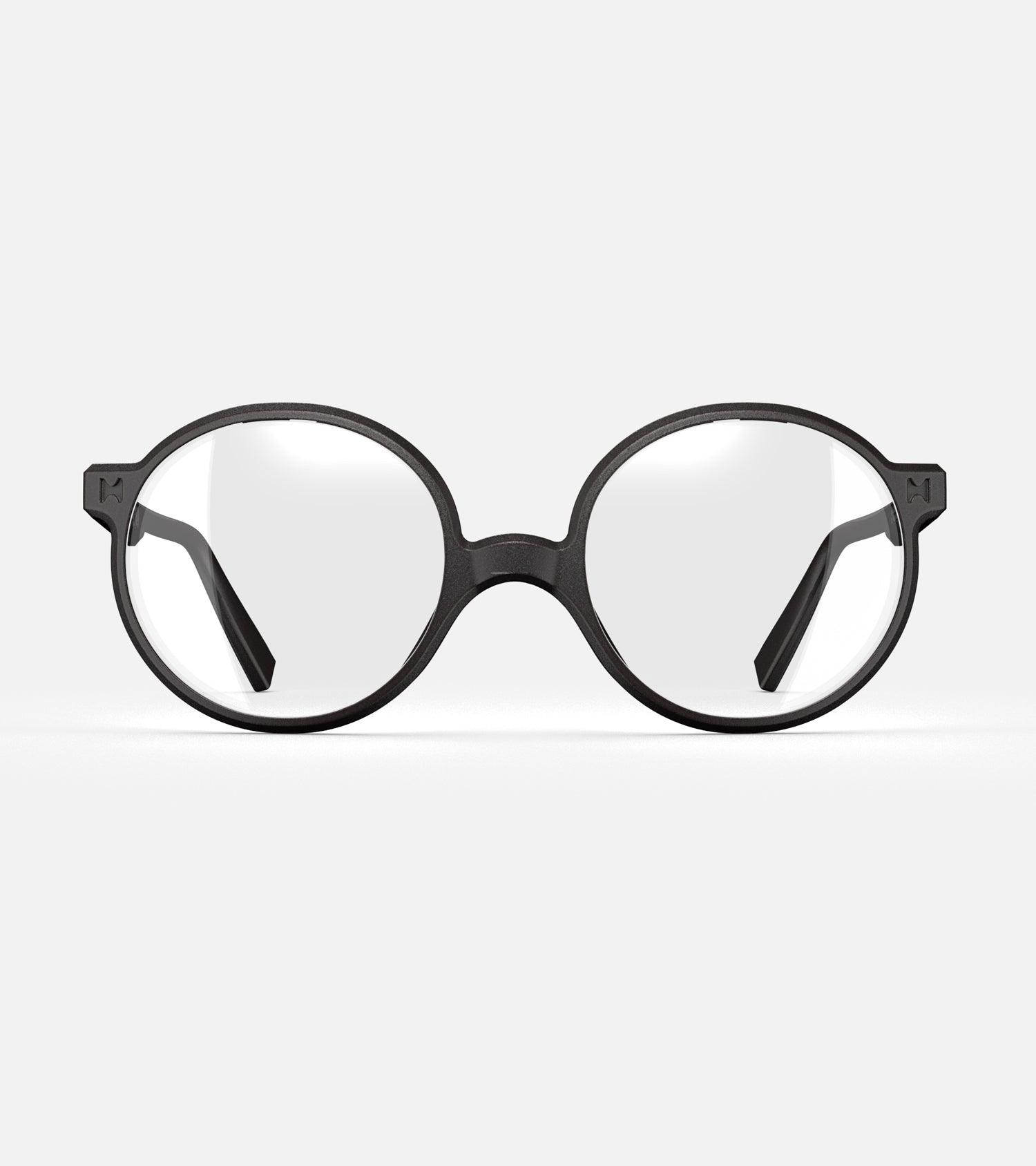 Round black 3D-printed glasses with clear lenses are designed for an excellent fit across various nose profiles. Offering stylish and comfortable option for those seeking unique and customizable eyewear.