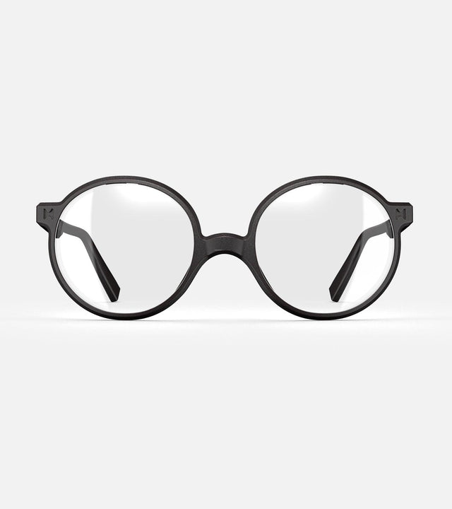 Round black 3D-printed glasses with clear lenses are designed for an excellent fit across various nose profiles. Offering stylish and comfortable option for those seeking unique and customizable eyewear.