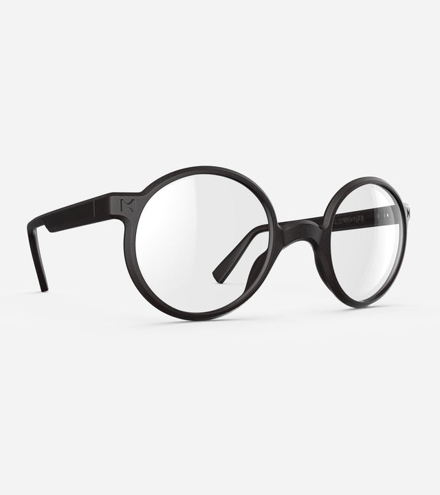 Round black 3D-printed glasses with clear lenses are designed for an excellent fit across various nose profiles. Offering stylish and comfortable option for those seeking unique and customizable eyewear.