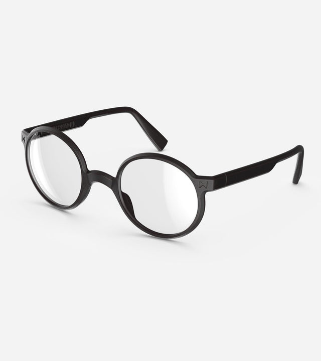 Round black 3D-printed glasses with clear lenses are designed for an excellent fit across various nose profiles. Offering stylish and comfortable option for those seeking unique and customizable eyewear.
