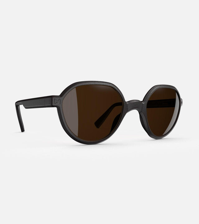 3D printed modern black round sunglasses with brown lenses, offering a stylish and sustainable choice for low nose bridges