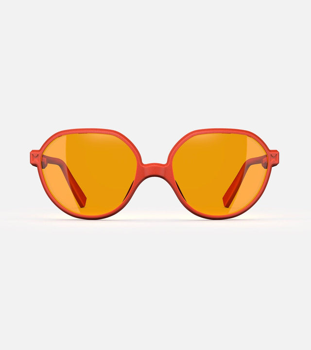 3D printed orange round sunglasses with yellow lenses, offering a stylish and sustainable choice for low nose bridges