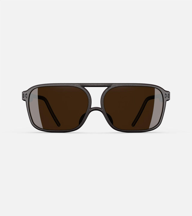 Low bridge, black rectangular framed sunglasses with brown lenses by reframd, featuring a modern design. Front view.