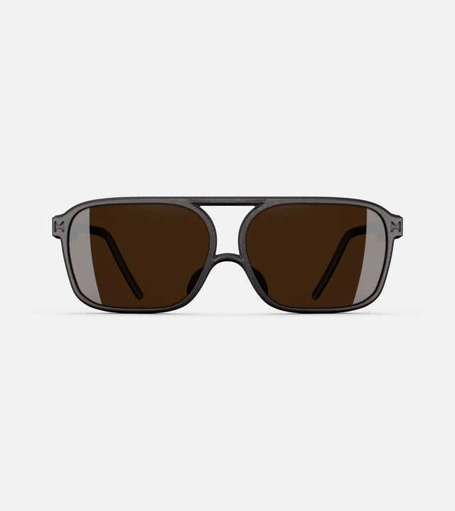 Black aviator glasses with a double bridge design, featuring dark lenses and sleek side arms for a bold, modern look.