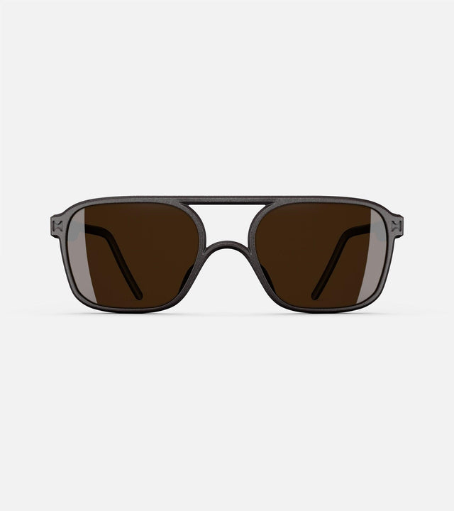 Wide bridge, black rectangular framed sunglasses with brown lenses by reframd, featuring a modern design. Front view.